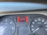 a close up of a car dashboard with a speedometer