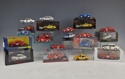 a lot of toy cars that are in a display case