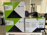 boxes are stacked on top of each other in a room