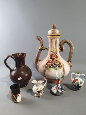 a group of vases that are sitting on a table