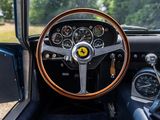 a steering wheel and dashboard of a classic car