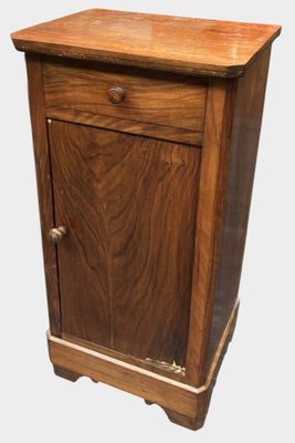 an image of a small wooden cabinet with a drawer