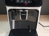 an image of a coffee machine on a wooden table