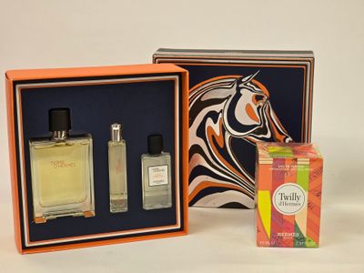 an image of a couple of perfume bottles in a box