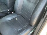two black seats in the back of a car