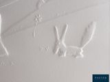 a picture of a bunny and a rabbit drawn in the snow