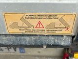 a sign on the back of a truck stating that the vehicle is not in service
