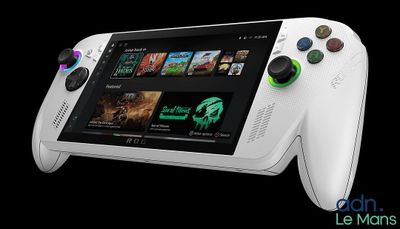 a close up of a video game controller with a game on the screen