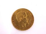 an image of a gold coin with a woman ' s head on it