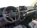 the interior of a car with a steering wheel, dashboard, and dashboard controls
