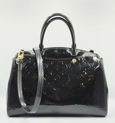 Sac à main Louis Vuitton en cuir noir à motif Monogramme, avec finitions dorées