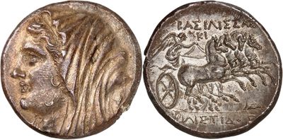 a silver coin with an image of a woman on it