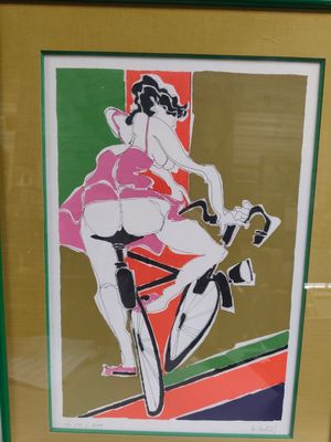tableau représentant une femme à vélo, dans un cadre vert