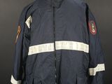 a navy jacket with white and red stripes on it