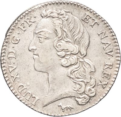 une pièce d'argent portant une tête de femme