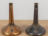 two vases that are sitting on a table