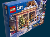 a box of lego city advent calendars on a blue background