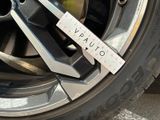 a close up of a tire with a measuring tape on it