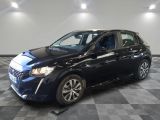 a blue car is parked in a room with a checkered floor