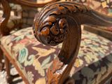 an image of a wooden chair with a floral upholstered seat