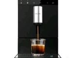 une image d'une machine à café avec une tasse de café à l'intérieur