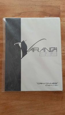 a white and black cd with a black and white logo on it