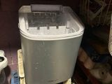 a toaster sitting on top of a stack of crates