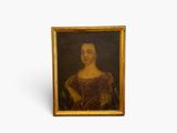 an old picture of a woman in a brown dress in a gold frame