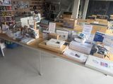 a table with a lot of items on it in a store