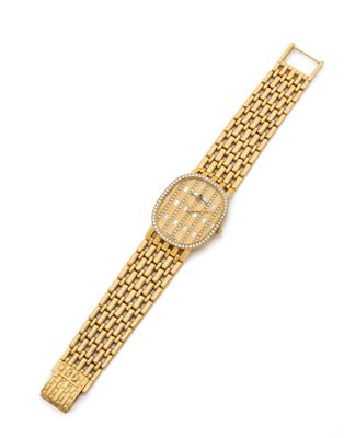 an 18k gold and diamond set wrist watch