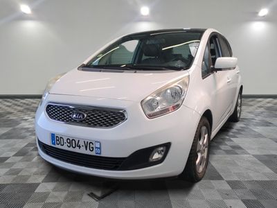 a picture of a white car parked in a garage