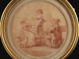 une vieille photo représentant une femme jouant du piano avec deux enfants