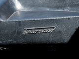 a close up of a motorcycle with a leather seat