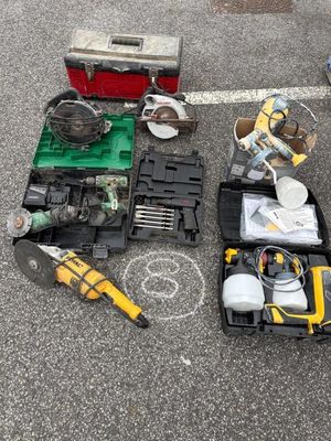 a lot of tools that are laying out on the ground