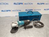 an electric angle grinder with a blue box on a table