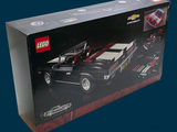 a black box with a lego car inside of it