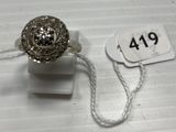 a ring that is sitting on top of a white table