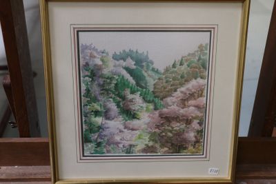 framed watercolor painting of a forest scene in a gold frame