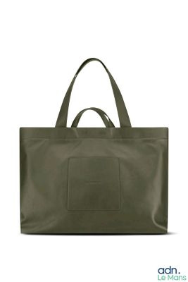 an olive green tote bag with a small pocket on the front