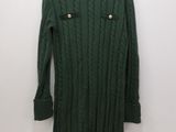 the sweater is green and has gold buttons on it