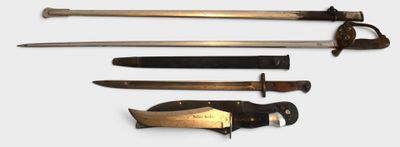 four different types of knives on a white surface