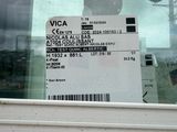 a ticket in the window of a vehicle with a barcode on it