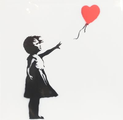a black and white picture of a girl holding a red balloon