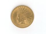 une pièce d'or sur laquelle est représentée une tête d'Indien