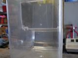 a plastic container sitting on top of a table