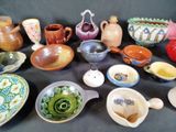 many different types of bowls and bowls on the table