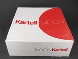 an open box of kartel moon on a black surface
