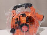 an orange blower sitting on top of a table covered in plastic