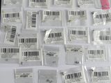 a lot of small pieces of plastic with barcodes on them