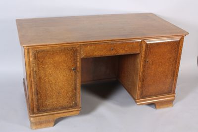 une image représentant un bureau avec un plateau en bois et deux tiroirs